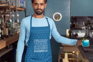 Apron Mockup Featuring a Barista with a Drink
