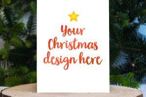 Christmas card mockup on a piece of wood