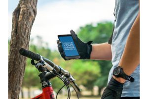Cyclist Using LG G3 at the Park Android Mock-Up