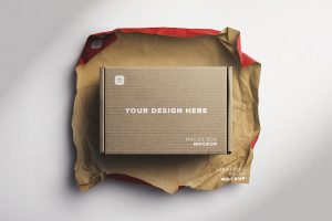 Mailer Box Mockup within Used Wrapping Paper