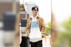 Mockup of a Man with Sunglasses Wearing a Pullover